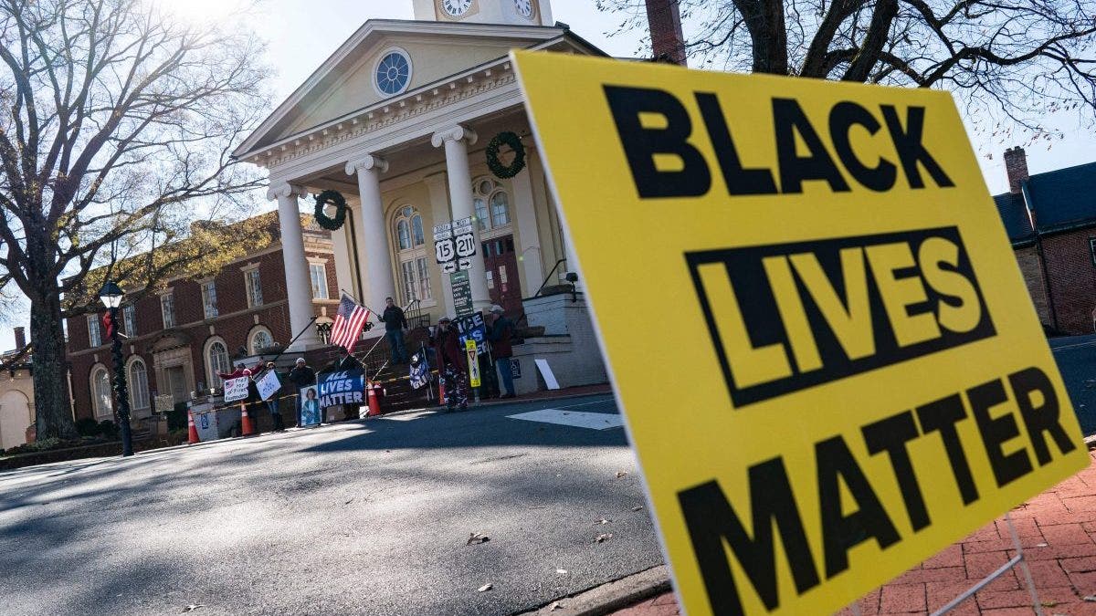 Black Lives Matter sign being held