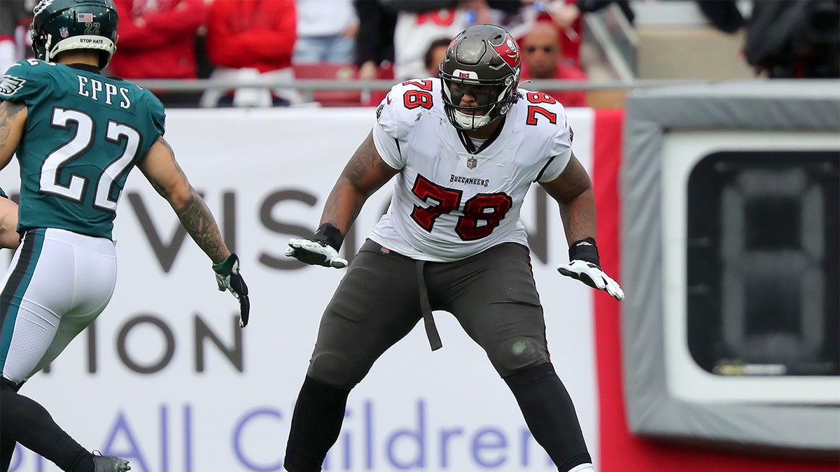 Tampa Bay Buccaneers Offensive Tackle Tristan Wirfs (78) pass blocks during the NFL Wild Card game between the Philadelphia Eagles and the Tampa Bay Buccaneers on January 16, 2022 at Raymond James Stadium in Tampa, Florida. 