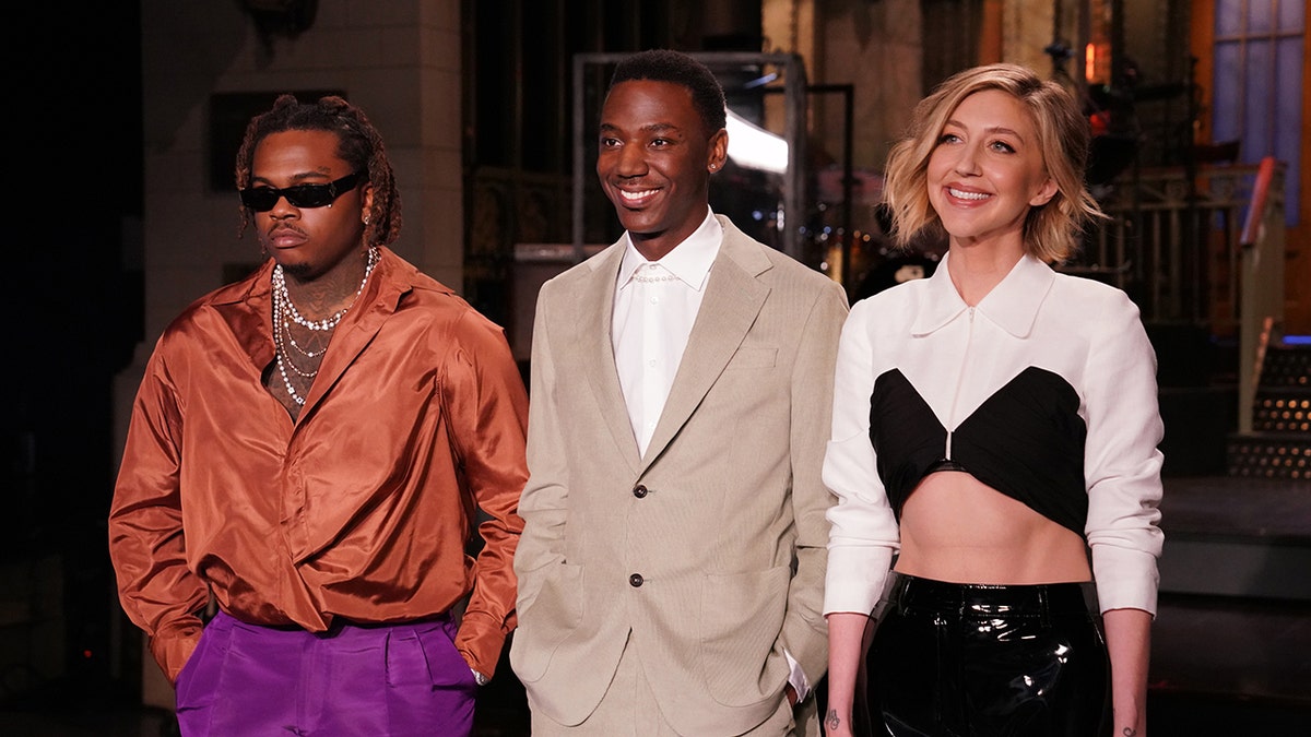 Gunna, left, host Jerrod Carmichael, and Heidi Gardner 