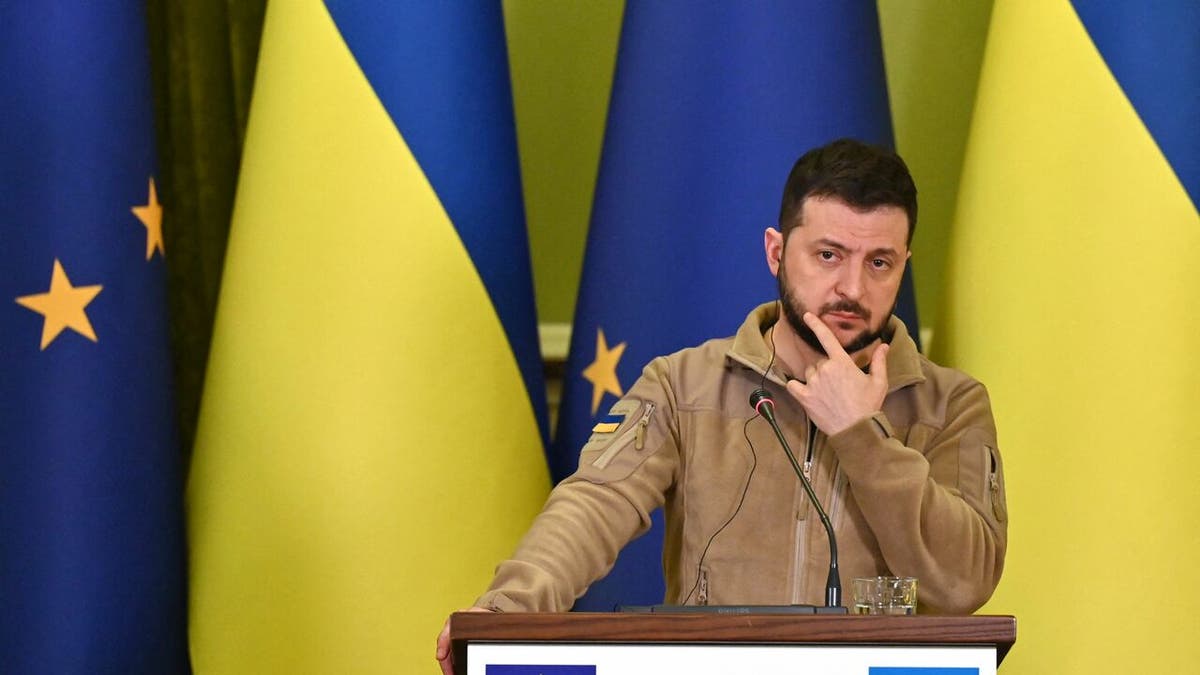 Ukraine's President Volodymyr Zelenskyy reacts during a press conference following his talks with President of the European Council in Kyiv