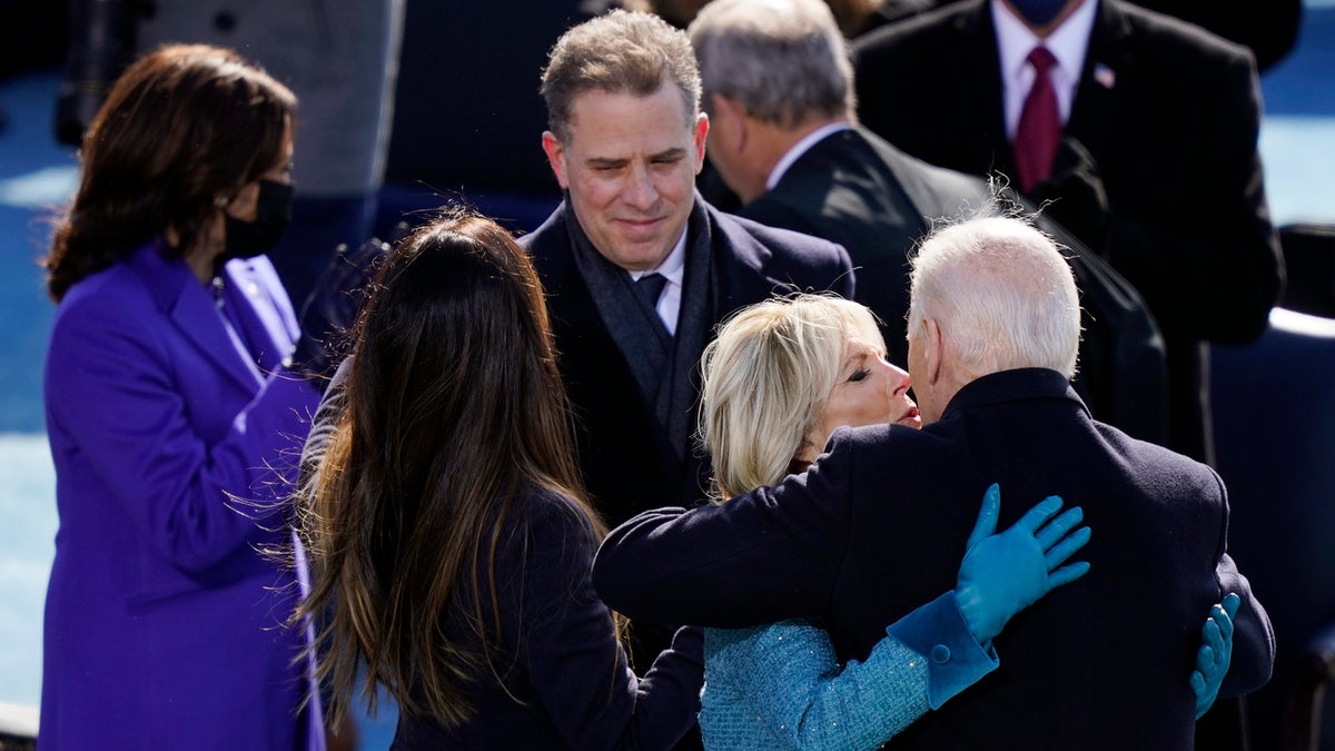 U.S. President Joe Biden embraces First Lady Dr. Jill Biden as son Hunter Biden, daughter Ashley Biden, and Vice President Kamala Harris look on after Biden was sworn in during his inauguration on the West Front of the U.S. Capitol on January 20, 2021 in Washington, DC. During today's inauguration ceremony Joe Biden becomes the 46th president of the United States.