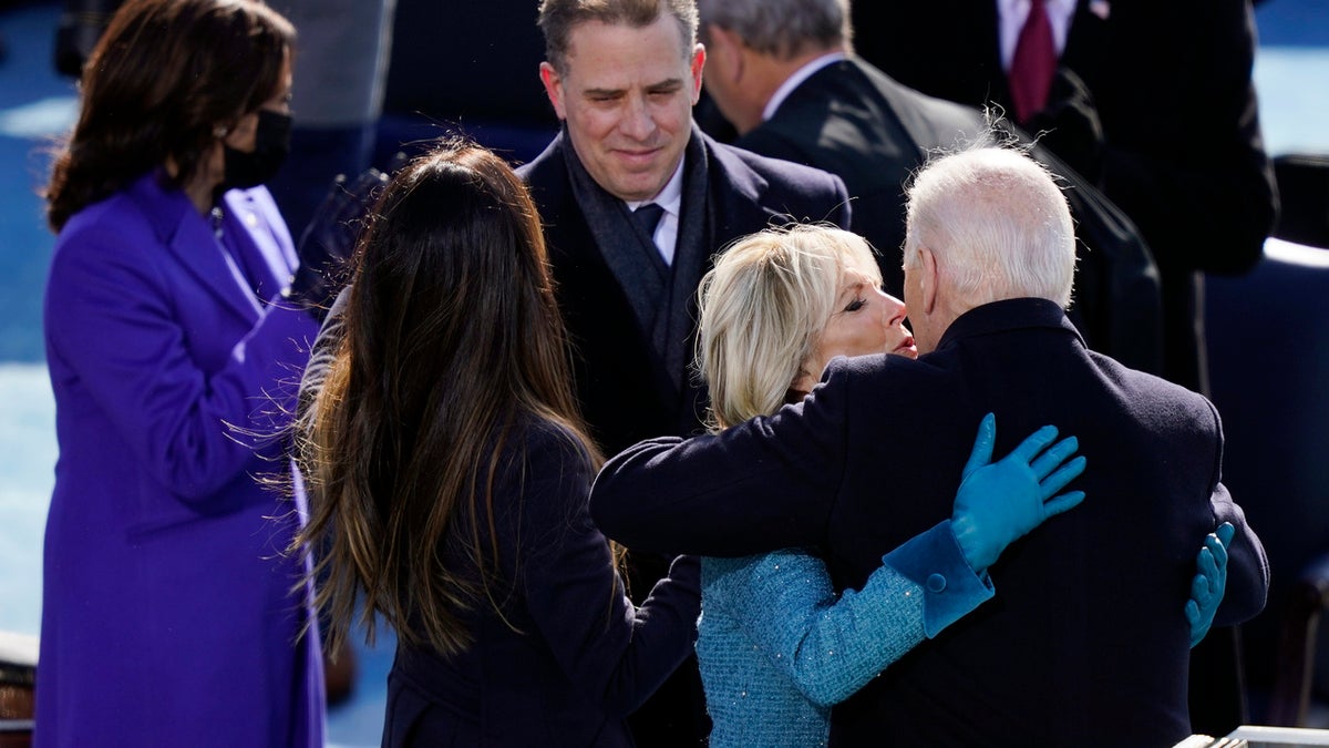 U.S. President Joe Biden embraces First Lady Dr. Jill Biden as son Hunter Biden, daughter Ashley Biden, and Vice President Kamala Harris look on after Biden was sworn in during his inauguration on the West Front of the U.S. Capitol on January 20, 2021 in Washington, DC. During today's inauguration ceremony Joe Biden becomes the 46th president of the United States.