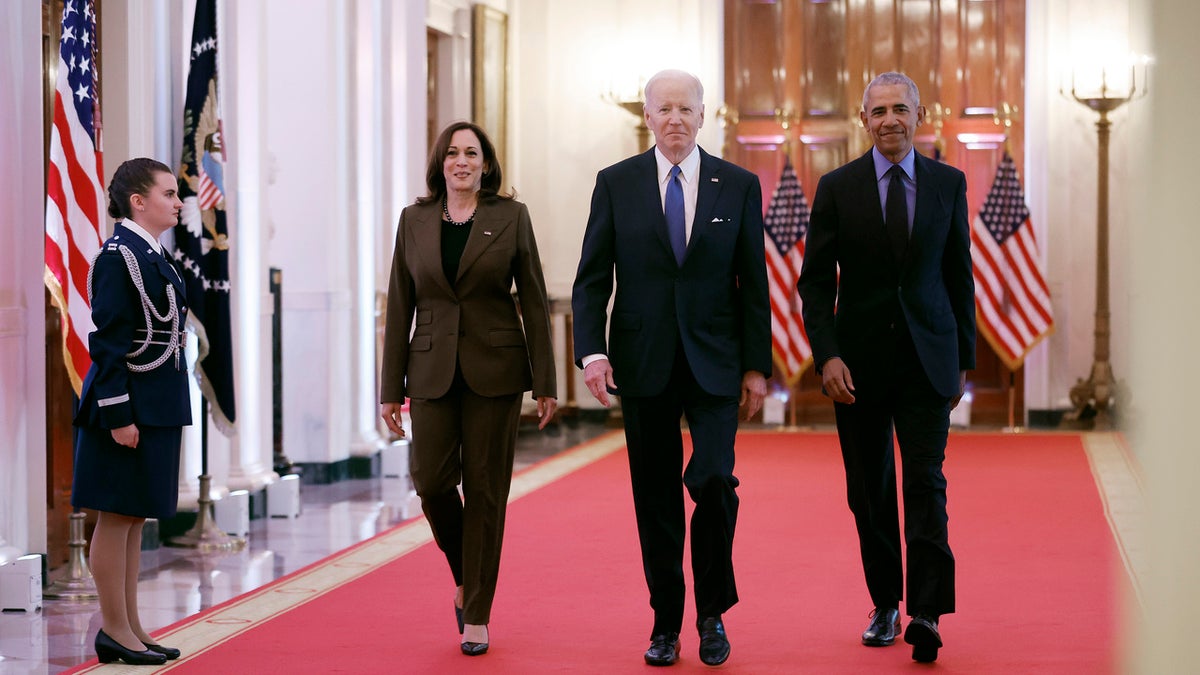 Vice President Kamala Harris, former President Barack Obama, and U.S. President Joe Biden arrive for an event to mark the 2010 passage of the Affordable Care Act in the East Room of the White House on April 5, 2022 in Washington, DC. With then-Vice President Joe Biden by his side, Obama signed 'Obamacare' into law on March 23, 2010.