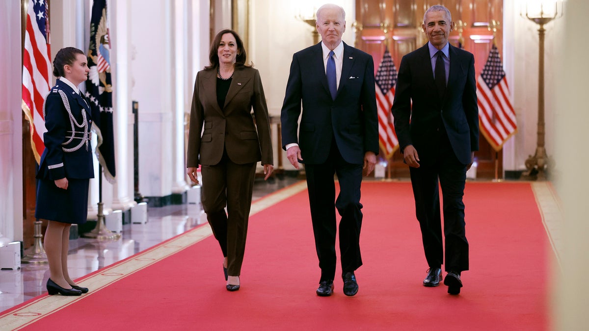 Vice President Kamala Harris, former President Barack Obama, and U.S. President Joe Biden arrive for an event to mark the 2010 passage of the Affordable Care Act in the East Room of the White House on April 5, 2022 in Washington, DC. With then-Vice President Joe Biden by his side, Obama signed 'Obamacare' into law on March 23, 2010.