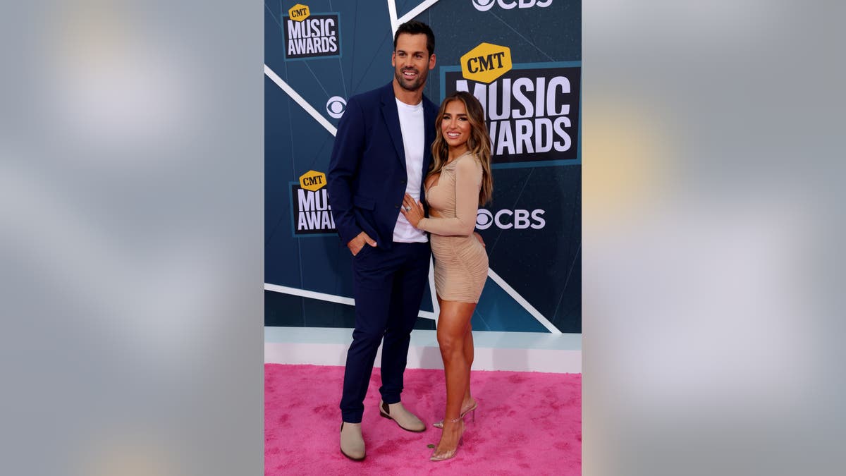 Jessie James Decker poses with husband Eric Decker