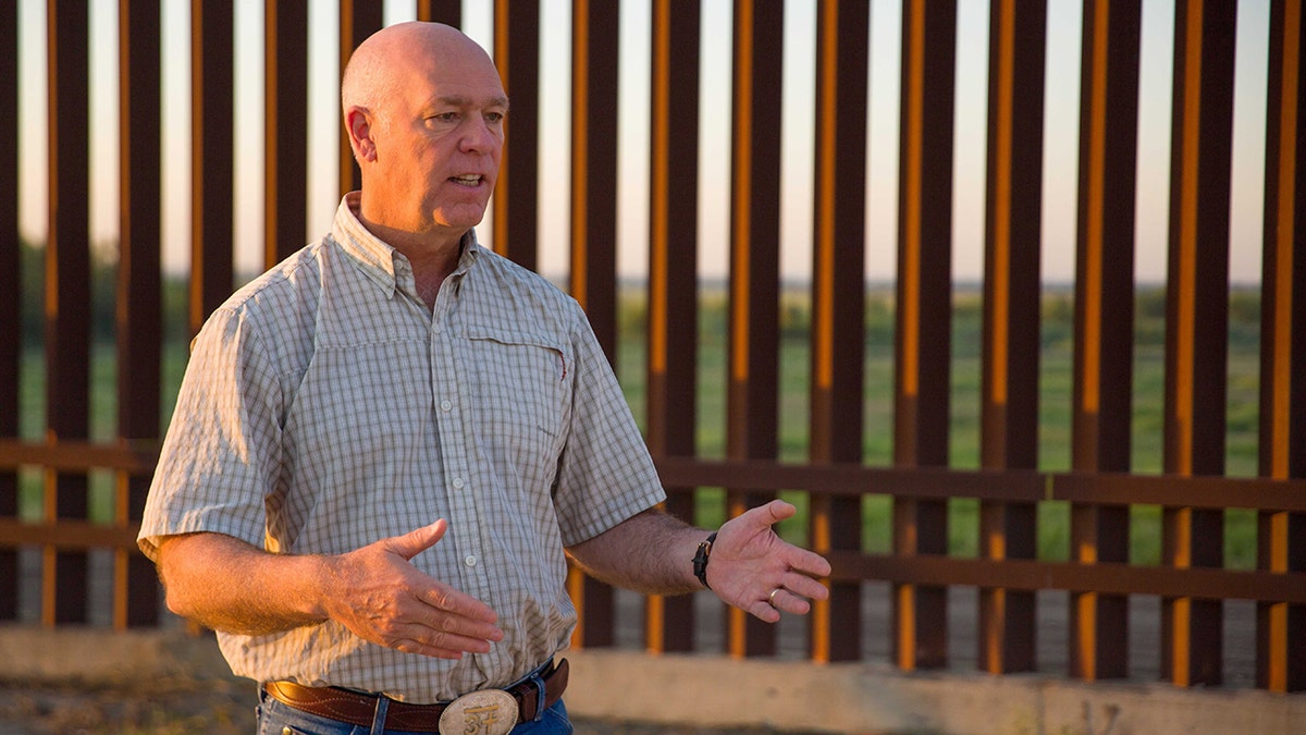 Montana Gov. Greg Gianforte receives a briefing on the crisis at the U.S.-Mexico border in October 2021 during a trip to Mission, Texas.