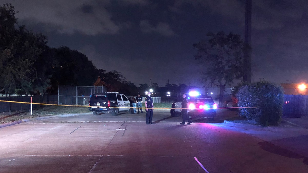 Houston police officers cordon