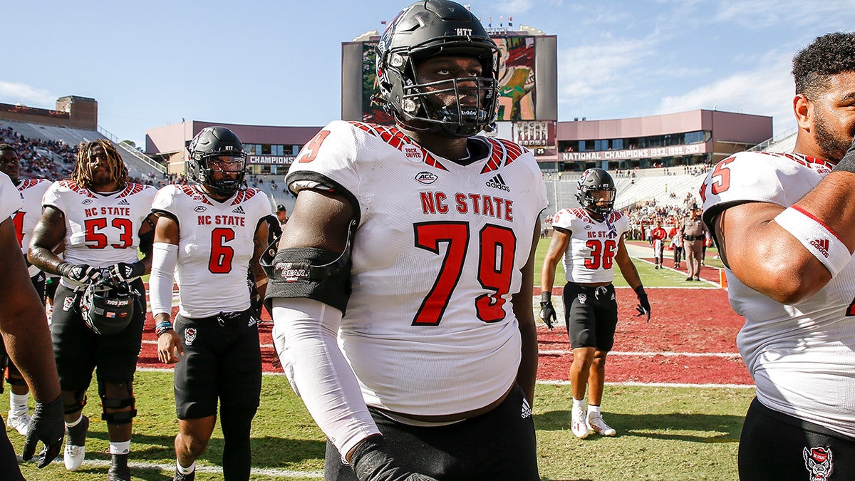 Tackle Ikem "Ickey" Ekwonu #79 of the NC State Wolfpack walks to the locker room before the start of the game against the Florida State Seminoles at Doak Campbell Stadium on Bobby Bowden Field on November 6, 2021 in Tallahassee, Florida.