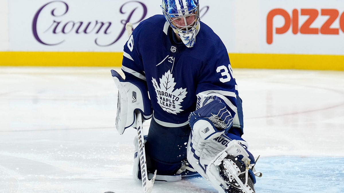 Toronto Maple Leafs goaltender Jack Campbell (36) makes a save on the Philadelphia Flyers during the third period of an NHL hockey game Tuesday, April 19, 2022 in Toronto.