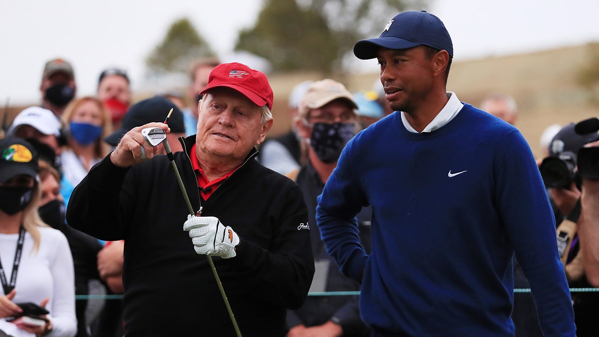 Tiger Woods shares a moment with Jack Nicklaus