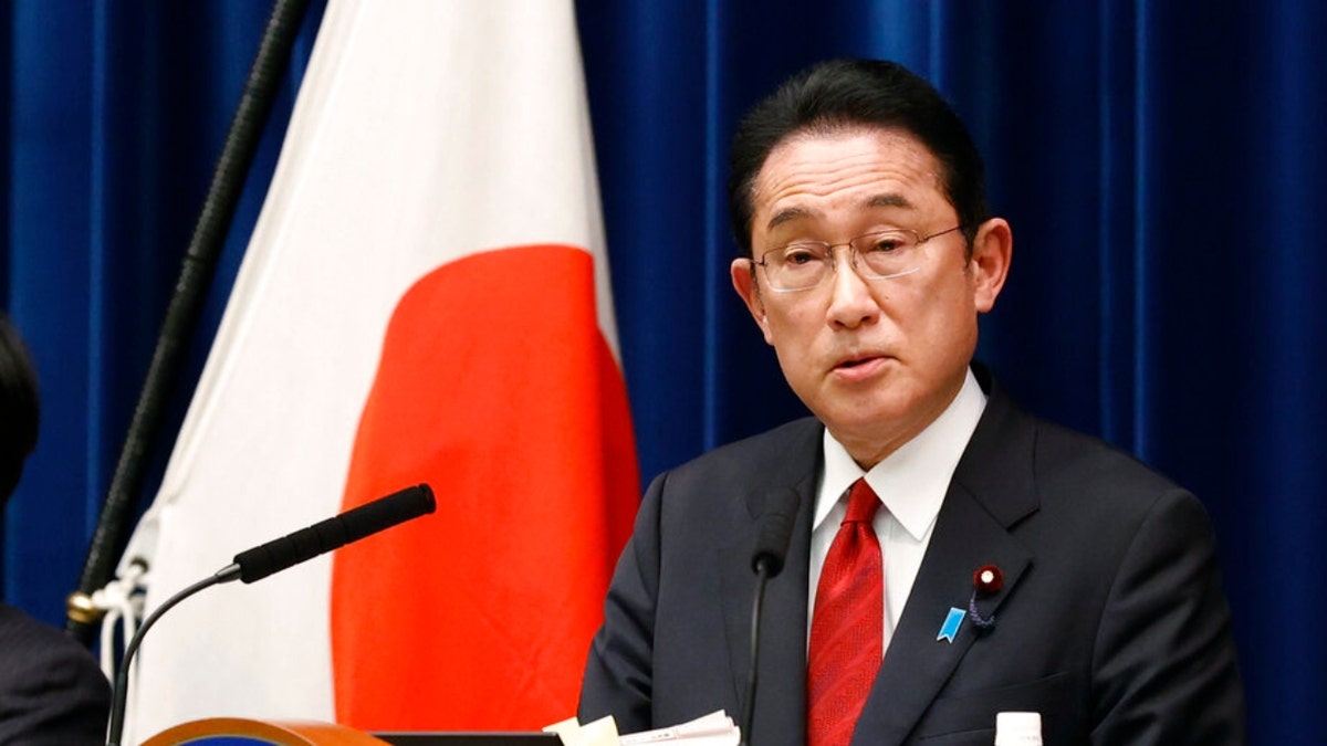 Japanese PM Fumio Kishida at lectern