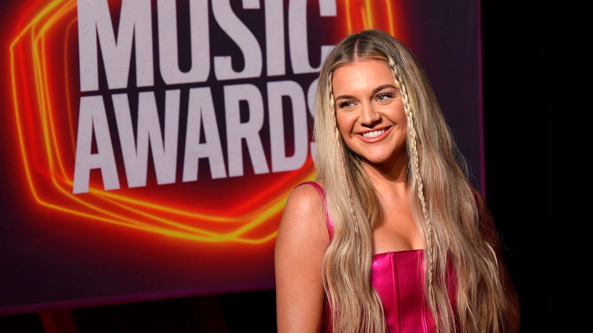 Kelsea Ballerini will host the CMT Music Awards from home after contracting COVID-19.