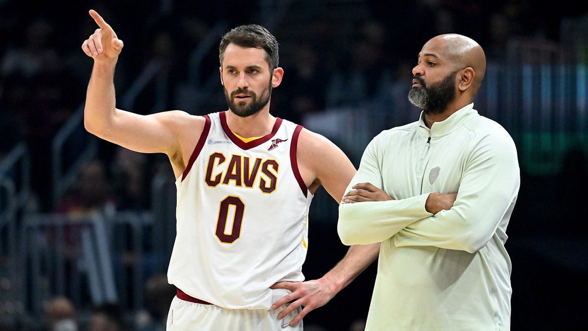 Kevin Love talks with Head coach J.B. Bickerstaff of the Cleveland Cavaliers