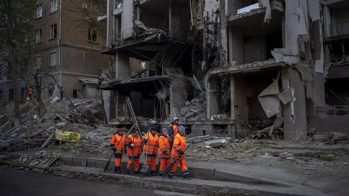 Clean-up crews prepare to work on Friday, April 29 at the site of an explosion in Kyiv, Ukraine.?