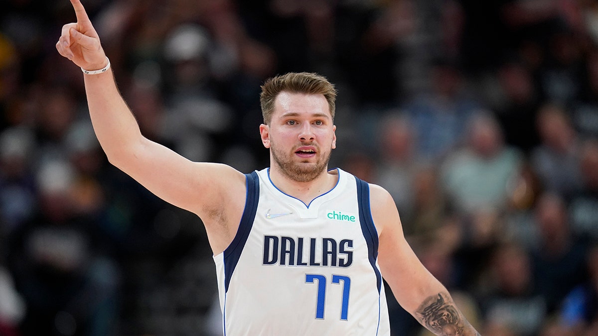 Dallas Mavericks guard Luka Doncic (77) gestures in the second half of Game 6 of an NBA basketball first-round playoff series against the Utah Jazz, Thursday, April 28, 2022, in Salt Lake City.