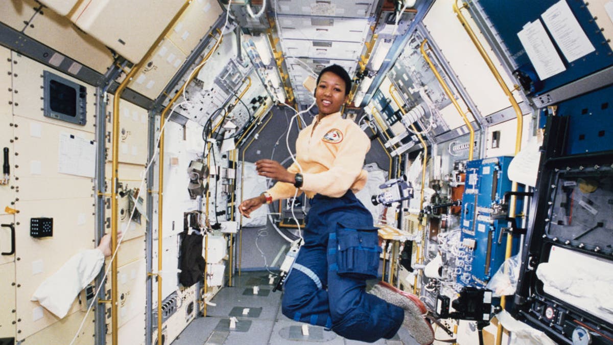 American engineer and astronaut Mae Jemison works in zero gravity in the centre aisle of the Spacelab Japan (SLJ) science module aboard OV-105, the Space Shuttle Endeavour, during NASA's STS-47 mission, 20th September 1992. Jemison is a Mission Specialist (MS) on the flight, and is the first Black woman to travel into space. 