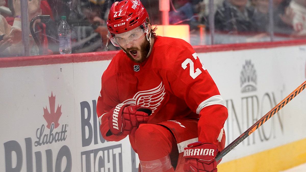 Detroit Red Wings center Michael Rasmussen (27) celebrates his goal against the Boston Bruins in the second period of an NHL hockey game Tuesday, April 5, 2022, in Detroit.