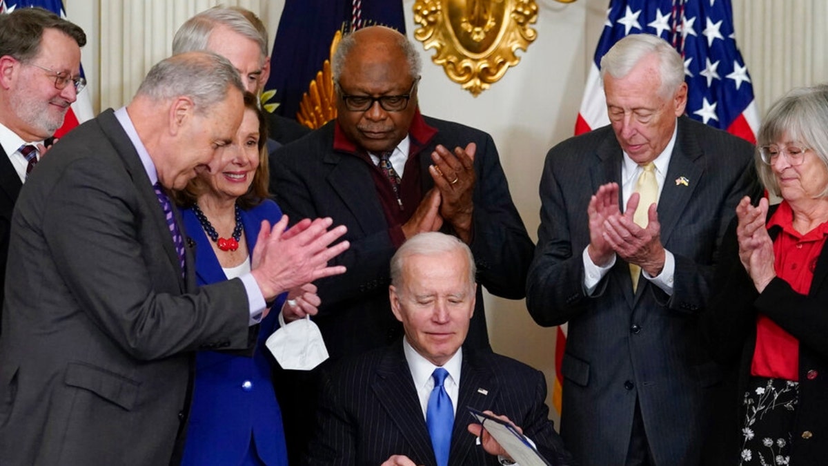 President Biden signs the Postal Service Reform Act of 2022