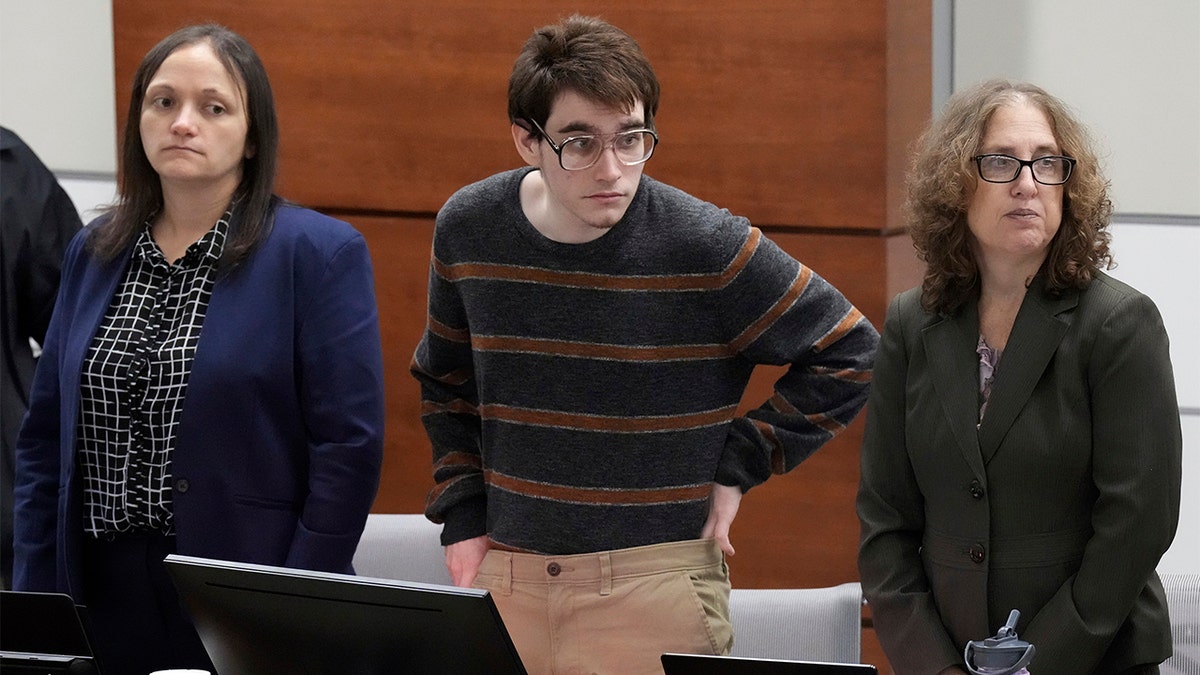Nikolas Cruz wearing a striped shirt in court during jury selection