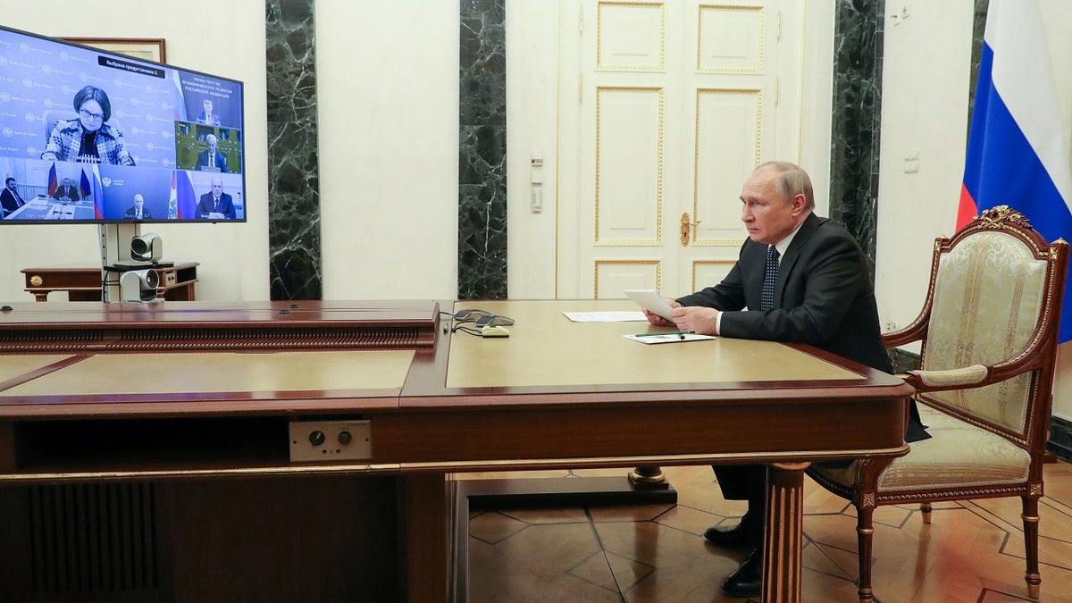 Russian President Vladimir Putin chairs a meeting on economic issues via a video link in Moscow, Russia, on Monday, April 25.