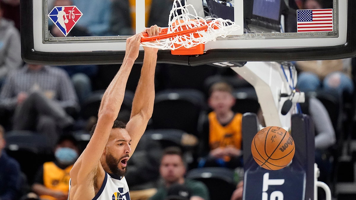 Utah Jazz center Rudy Gobert (27) dunks against the Oklahoma City Thunder during the first half of an NBA basketball game Wednesday, April 6, 2022, in Salt Lake City.
