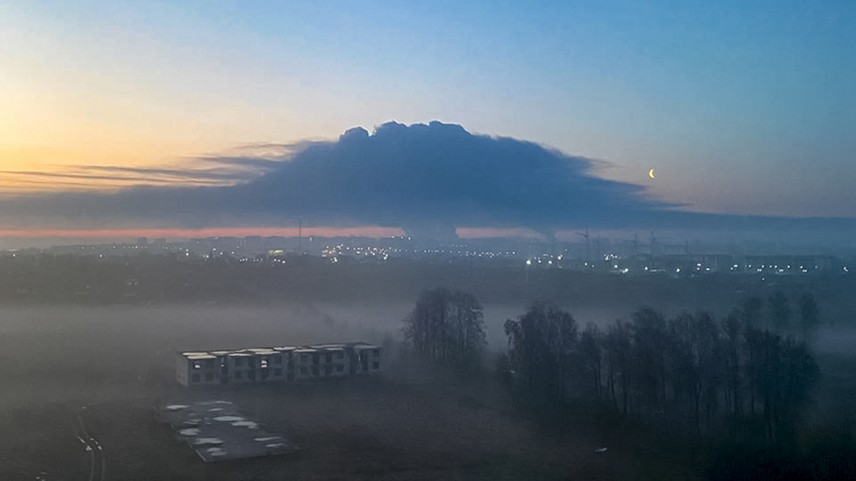 Smoke rises into the sky during the fire in Bryansk, Russia, on Monday, April 25.