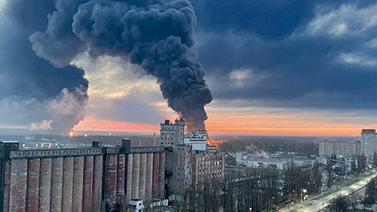 In this photo taken by an anonymous source, smoke rises from oil storage facilities hit by fire in Bryansk, Russia, on Monday, April 25.