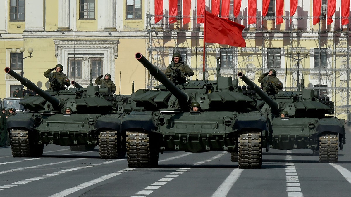 Russian military vehicles move on Dvortsovaya Square during a rehearsal for the Victory Day military parade in Saint Petersburg on April 28, 2022. Russia will celebrate the 77th anniversary of the 1945 victory over Nazi Germany on May 9. (Photo by OLGA MALTSEVA/AFP via Getty Images)