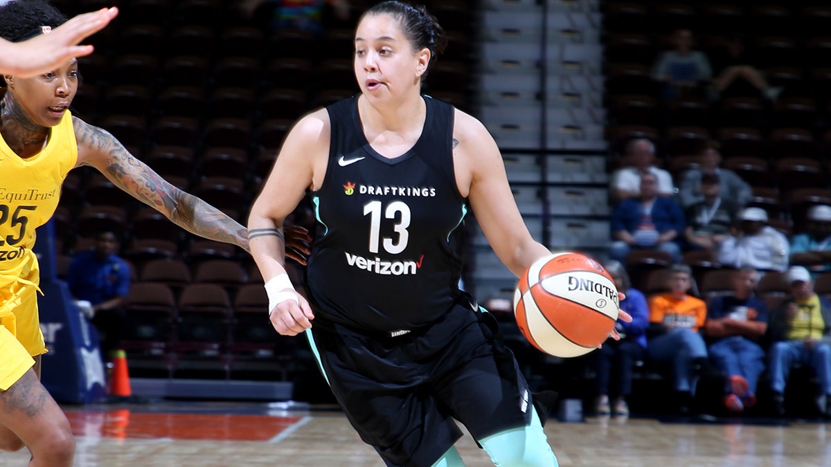 Shoni Schimmel #13 of the New York Liberty handles the ball against the Los Angeles Sparks during a pre-season game on May 8, 2018 at Mohegan Sun Arena in Uncasville, Connecticut.