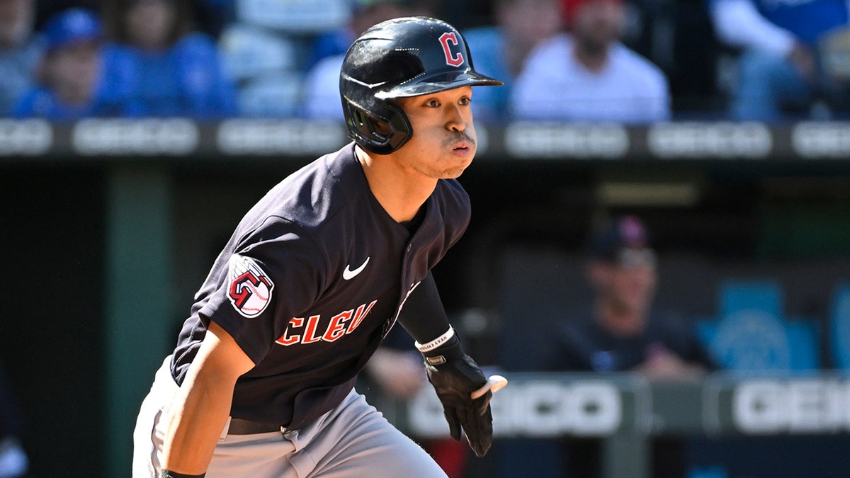 Cleveland Guardians' Steven Kwan hits a three-RBI triple during the eighth inning of a baseball game against the Kansas City Royals, Monday, April 11, 2022 in Kansas City, Mo.