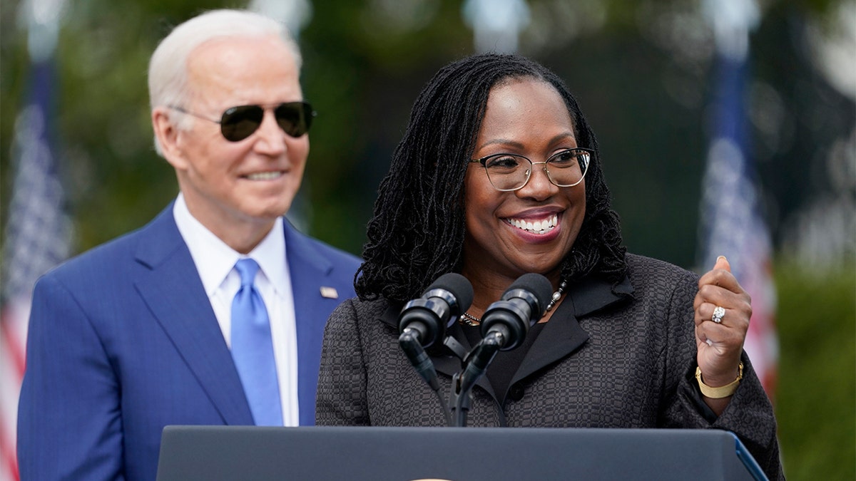 President Biden listens as Judge Ketanji Brown Jackson speaks during an event on the South Lawn of the White House in Washington, Friday, April 8, 2022, celebrating the confirmation of Jackson as the first Black woman to reach the Supreme Court. (AP Photo/Andrew Harnik)