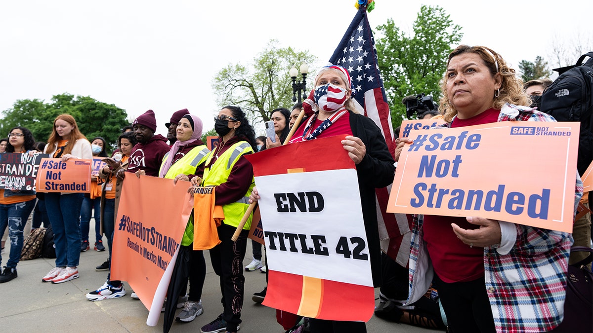 Immigration activists demonstrate in front of the U.S. Supreme Court in Washington on Tuesday, April 26, 2022, as the Supreme Court hears oral arguments in the Biden v. Texas case. The court is considering whether President Biden can end a Trump-era border policy that denies asylum-seekers entry to the US while their case is reviewed. (Bill Clark/CQ-Roll Call, Inc via Getty Images)