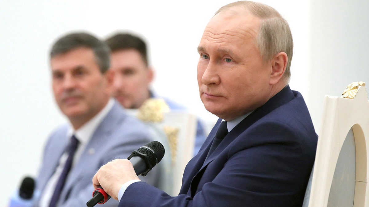 Russian President Vladimir Putin looks on as he holds a meeting of the Russia - Land of Opportunity platform supervisory board at the Catherine's Hall of the Kremlin in Moscow on April 20, 2022.