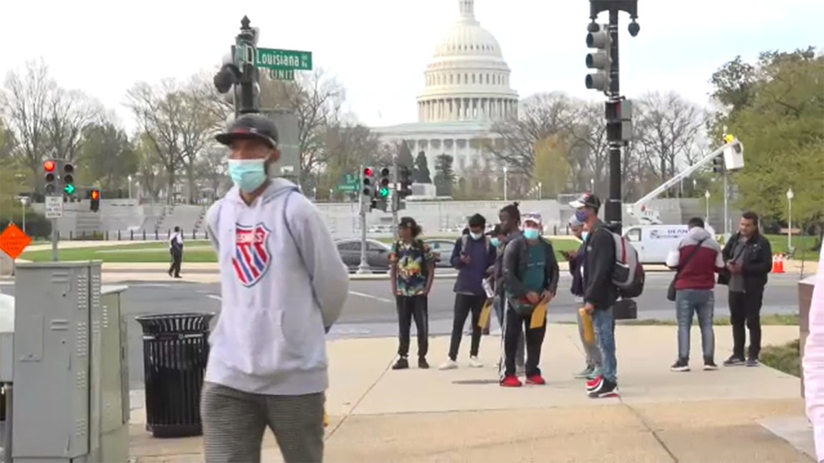 A group of migrants were bussed from Texas to Washington, D.C., where they were dropped off blocks from the U.S. Capitol, Wednesday, April 13, 2022.