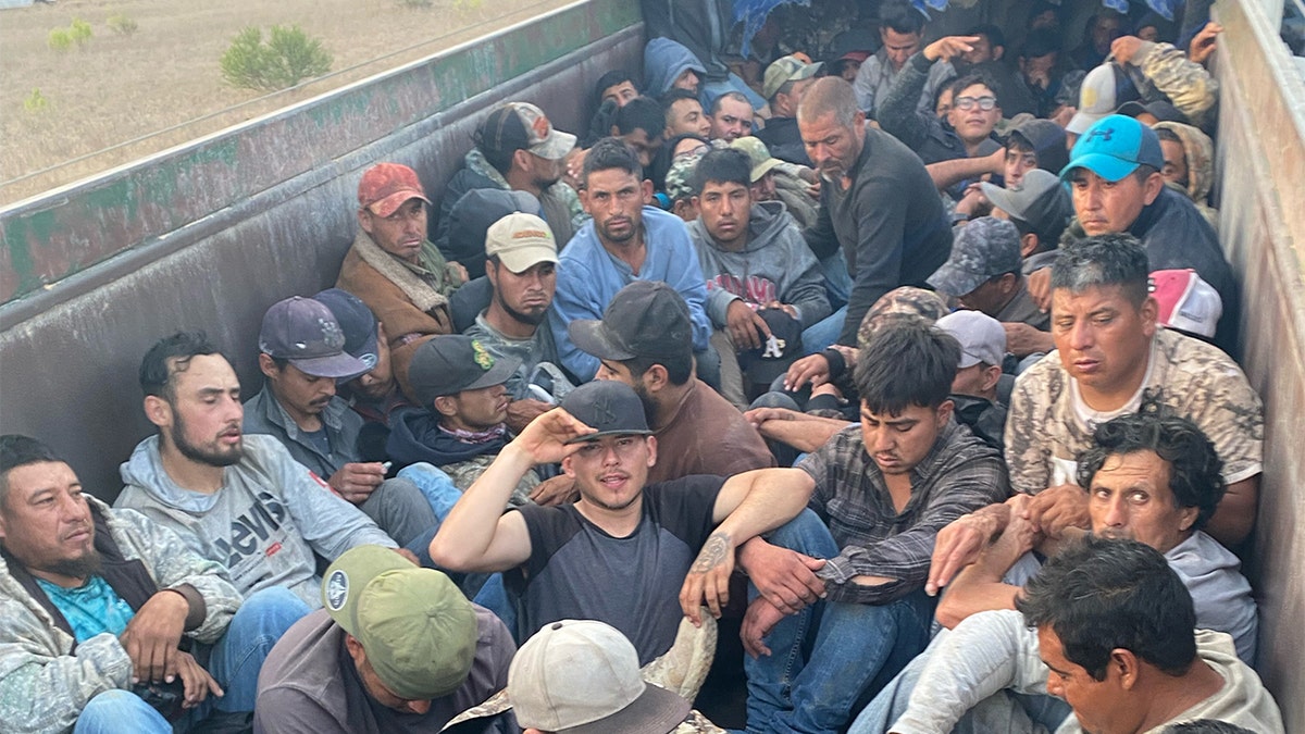 Texas Department of Public Safety officers found 76 migrants being smuggled inside a trailer in Dimmit County, Texas, Thursday, March 31, 2022. The suspected driver is a Honduran national who was in the U.S. illegally and was arrested for human smuggling, the Texas DPS said.
