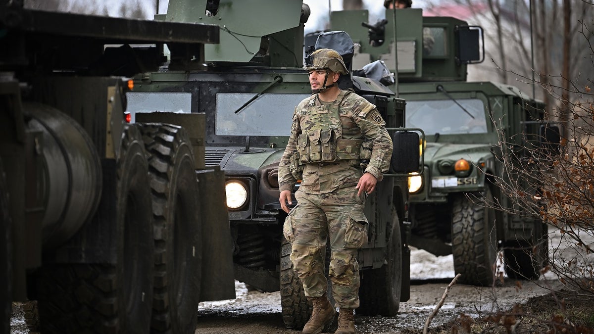 U.S. Soldiers from the 82nd Airborne take part in an exercise outside the operating base at the Arlamow Airport on Tuesday in Wola Korzeniecka, Poland. 