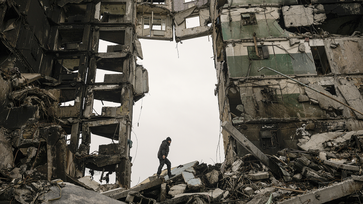 resident in bombed-out building in Ukraine