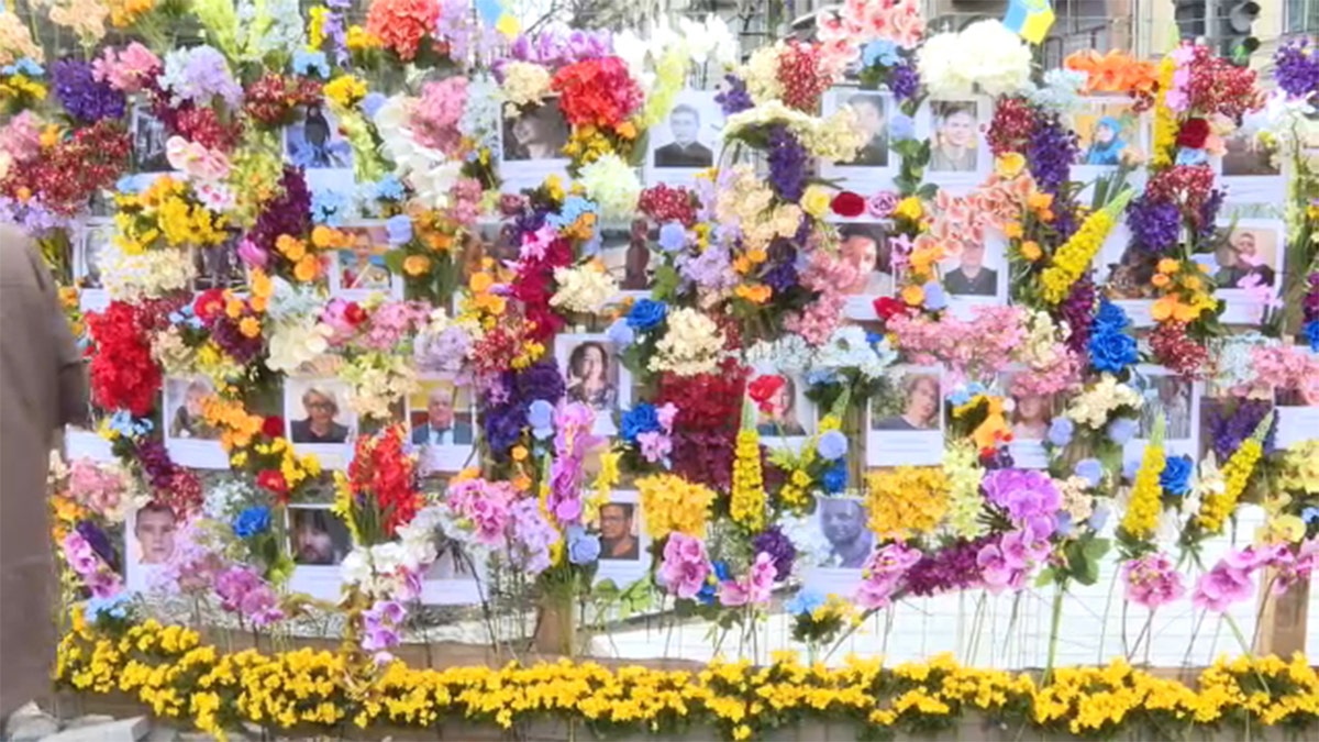 An American in Ukraine helped create a tribute wall for victims of Russia's war.