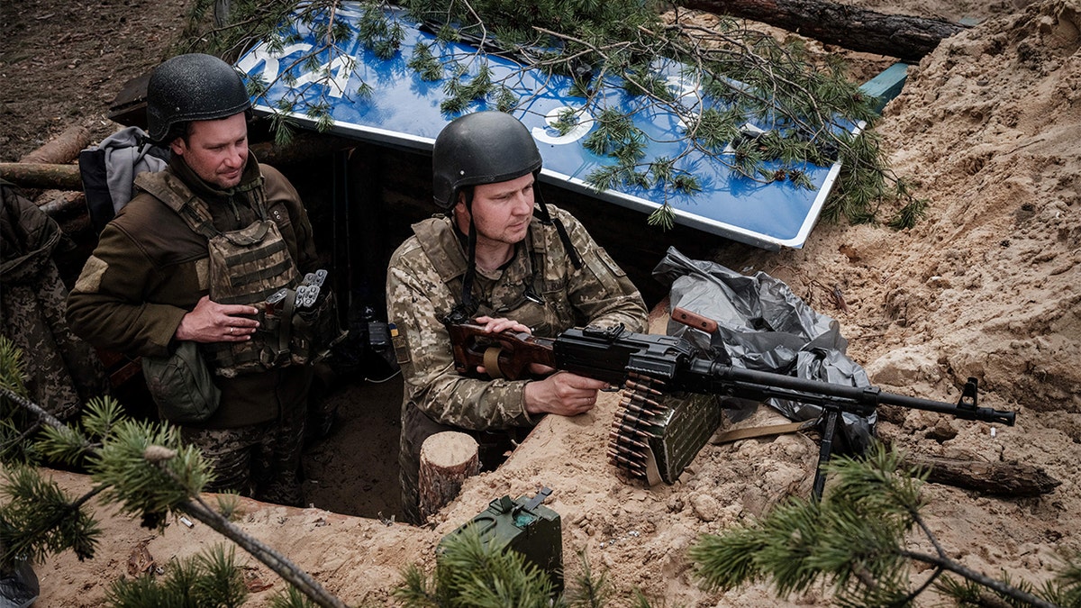 TOPSHOT - Ukrainian soldiers rest at their position near Lyman, eastern Ukraine, on April 28, 2022, amid Russian invasion of Ukraine. (Photo by YASUYOSHI CHIBA/AFP via Getty Images)