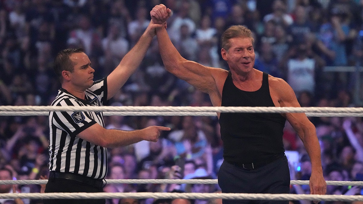 WWE owner Vince McMahon celebrates during WrestleMania at AT&T Stadium in Arlington, Texas, on Apr 3, 2022.