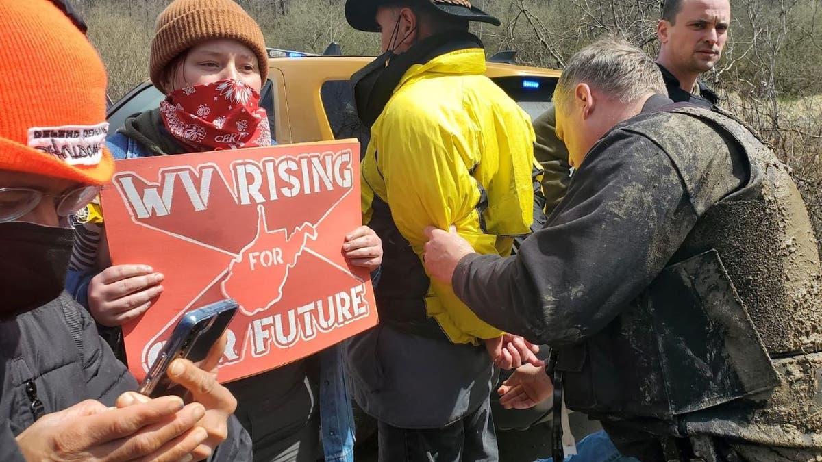 Joe Manchin faces climate activists