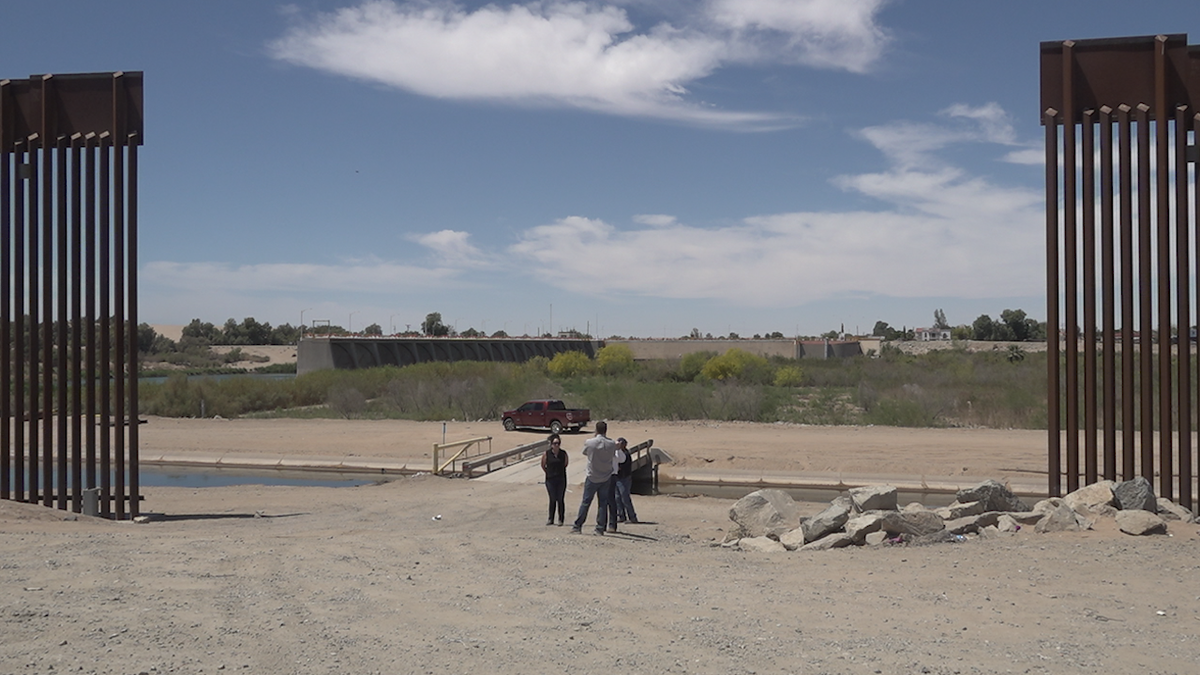 Yuma Arizona residents at Mexico border wall gap