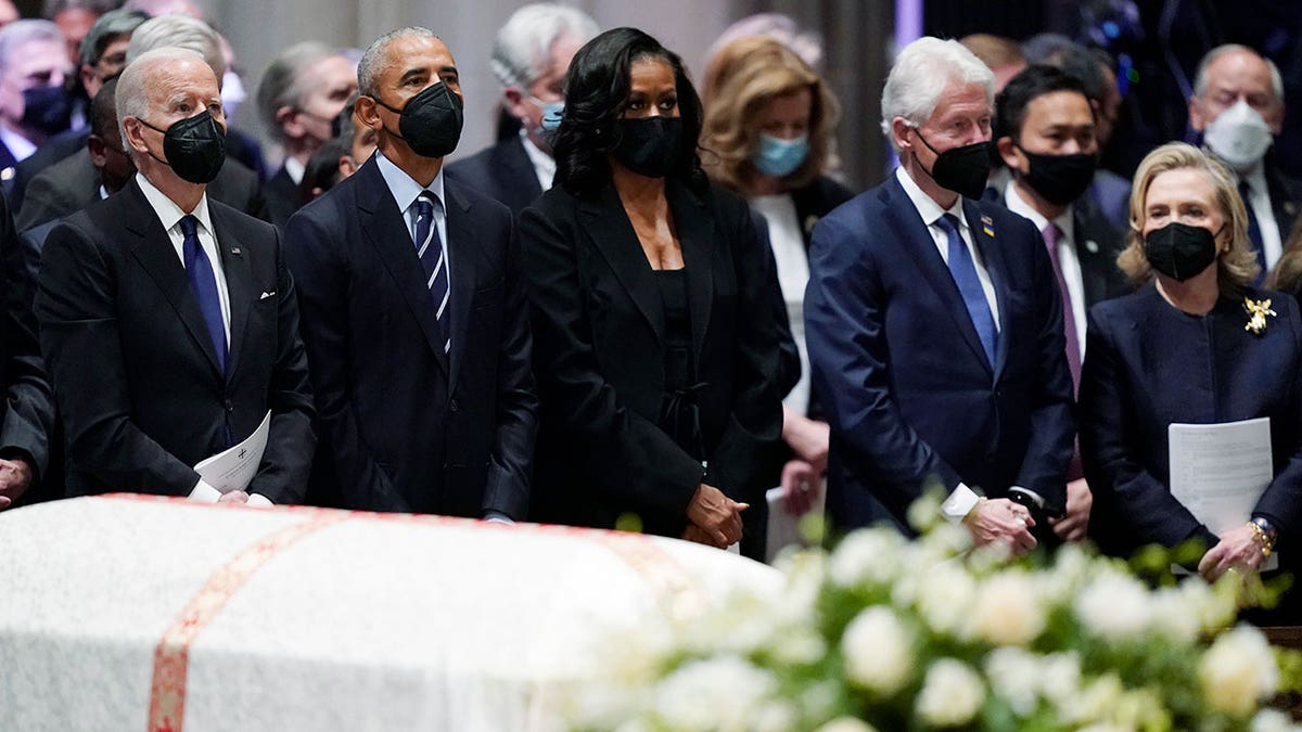 President Joe Biden, left, former President Barack Obama, former first lady Michelle Obama, former President Bill Clinton and former Secretary of State Hillary Clinton, during the funeral service for former Secretary of State Madeleine Albright at the Washington National Cathedral, Wednesday, April 27, 2022, in Washington. (AP Photo/Evan Vucci)