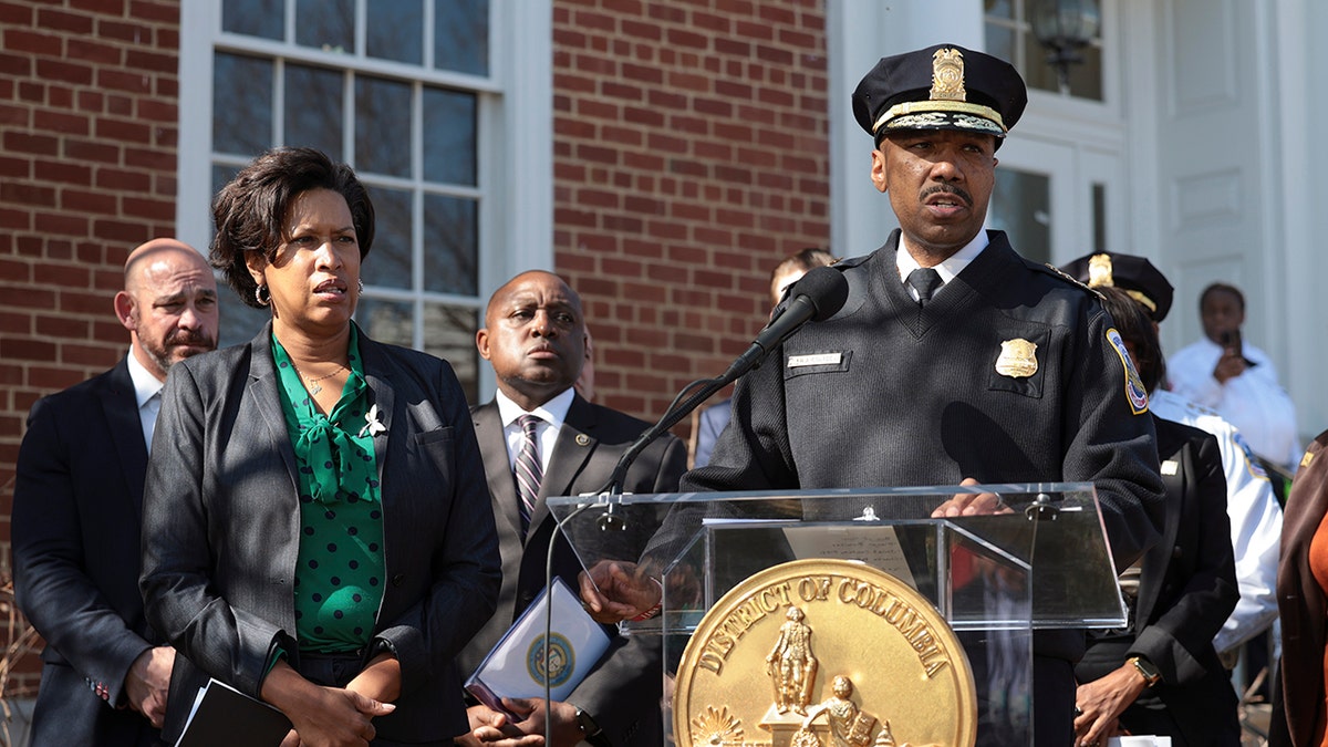 WASHINGTON, DC - MARCH 15: Washington Metropolitan Police Chief Robert Contee III (R), joined by Washington, DC Mayor Muriel Bowser (L) and Charlie Patterson, Special Agent in Charge (SAC) of the Washington Field Division for the Bureau of Alcohol, Tobacco, Firearms and Explosives (ATF), speaks at a press conference on the shootings of homeless individuals in Washington, DC and New York City on March 15, 2022 in Washington, DC.
