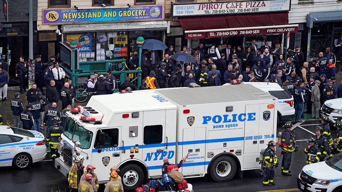 A gunman filled a rush-hour subway train with smoke and shot multiple people Tuesday, leaving wounded commuters bleeding on a platform as others ran screaming, authorities said