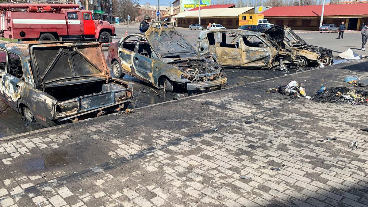 Burnt out vehicles are seen after a rocket attack on the railway station in the eastern city of Kramatorsk, in the Donbass region on April 8, 2022. - More than 30 people were killed and over 100 injured in a rocket attack on a train station in Kramatorsk in eastern Ukraine, the head of the national railway company said. 