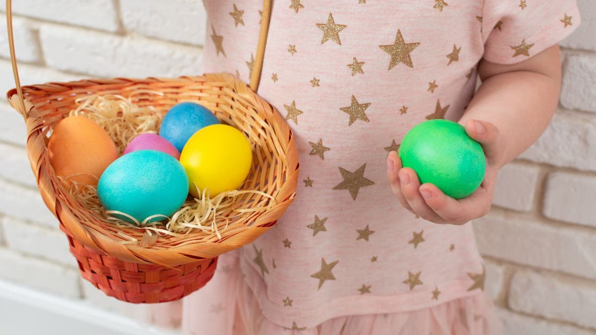 Child holds Easter basket