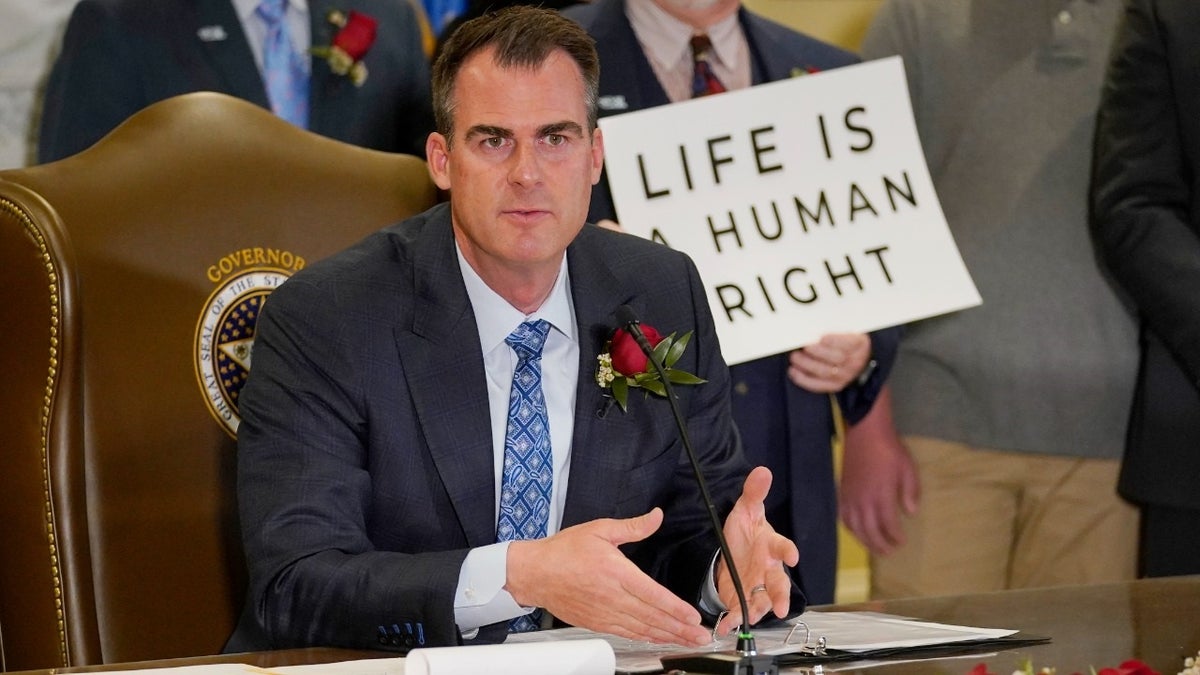 Oklahoma Gov. Kevin Stitt speaks after signing into law a bill making it a felony to perform an abortion.