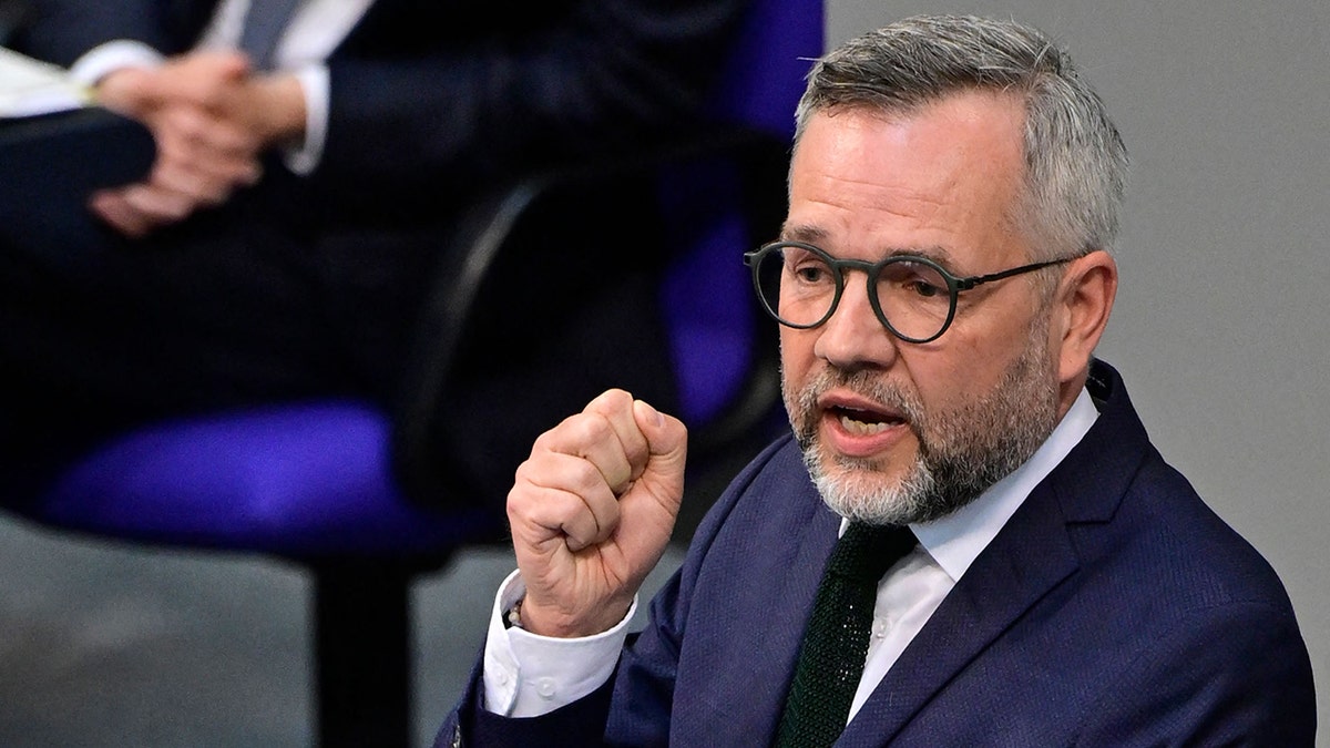 Michael Roth (R), Chair of the Committee on Foreign Affairs, speaks during a session of the Bundestag (lower house of parliament) in Berlin on April 6, 2022, with the debate focusing on civilians found dead in the Ukrainian town of Bucha.?