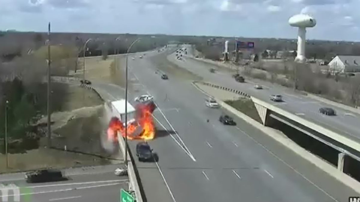 A box truck exploded along a highway in Minnesota on Monday after a car lost control and collided with the truck, authorities said.
